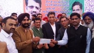 DRM received cheque from Distt Admn for RUB